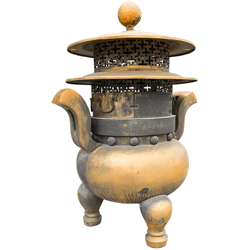 Ancien brûleur d'encens en bronze avec des motifs traditionnels chinois, utilisé pour des rituels ou des cérémonies spirituelles.